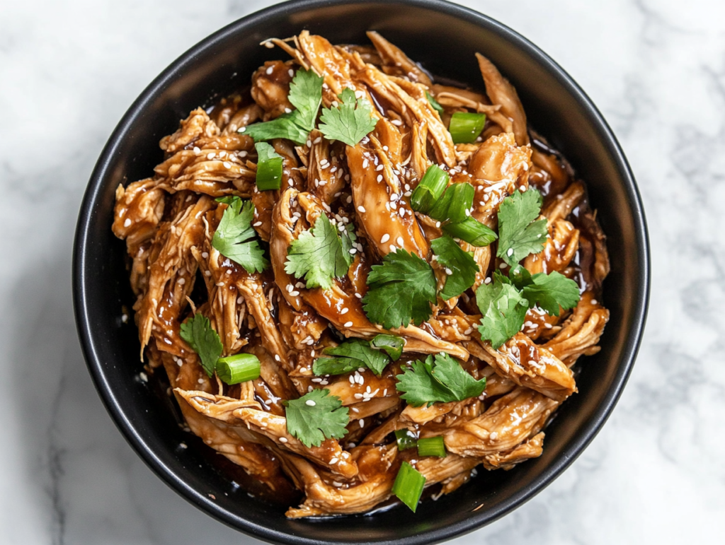 This image shows the dish garnished with green onions, cilantro, and toasted sesame seeds