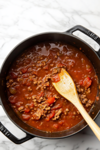 stirring-the-soup to mix the flavor evenly