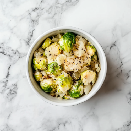 This image shows the Instant Pot in Sauté mode, ready to cook Brussels sprouts and other ingredients for a flavorful dish.