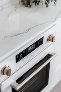 An image showing an oven being preheated to the broiler setting, the first step in preparing the cheesy bread recipe.