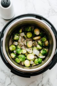 This image shows the Instant Pot lid being secured in place, ready to cook the Brussels sprouts under high pressure for a tender, flavorful result.