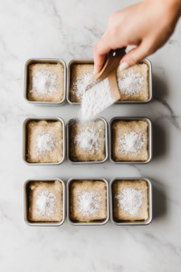 sprinkling-sugar-on-sweet-bread-batter