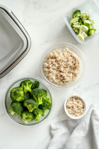 This image shows vibrant broccoli being steamed and other accompaniments being prepared to pair with the honey garlic shrimp.