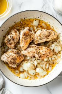 this image shows tossing chicken, until it is nearly fully cooked and turns white on the outside, about 3–5 minutes.