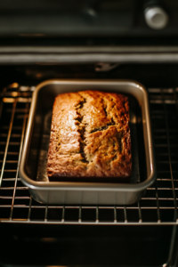 freshly-baked-banana-bread-cooling-on-a-wire-rack