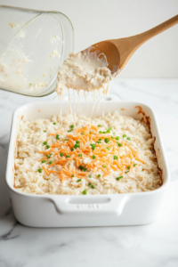 mixing-softened-cream-cheese-butter-and-other-ingredients-for-casserole