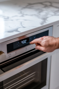 This image shows an oven being preheated to 400°F, ensuring the perfect crispiness when baking the potato taquitos.