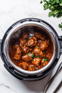 This image shows steam escaping as the Instant Pot lid is carefully opened, revealing the cooked jerk chicken inside.