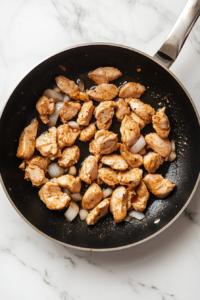 sauteing-onions-and-garlic-in-skillet-for-flavorful-base