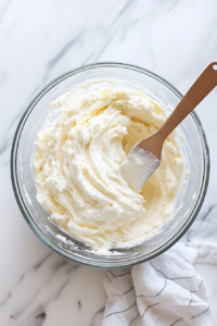 This image shows the final, smooth batter for the vanilla buttermilk pound cake, perfectly mixed and ready to be poured into the pan.