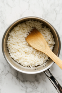 cooking-rice-until-water-evaporates-for-rice-pudding-recipe