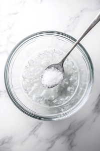 dissolving-salt-in-warm-water-to-prepare-the-flour-tortilla-dough