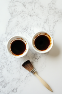 This image shows freshly made BBQ sauce being divided into separate bowls—one for basting and another for serving.