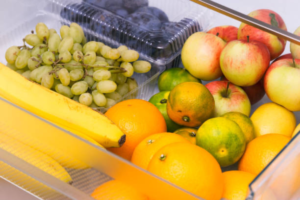 fruits-and-vegetables-stored-in-a-plastic-container-in-refrigerator